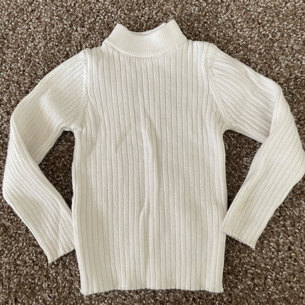 White ribbed turtle neck sweater